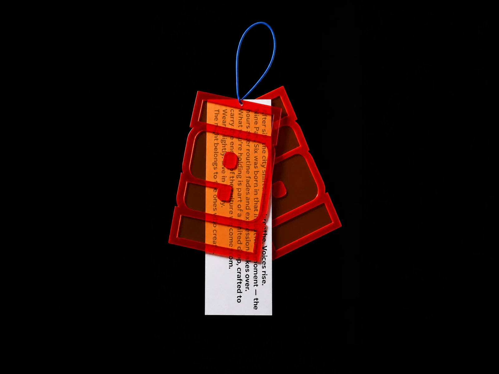 NinePastSix social artwork showing a red graphic hangtag suspended against black.